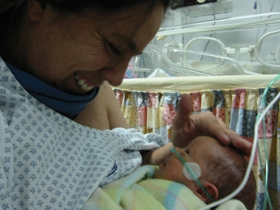 Premature baby with his mum